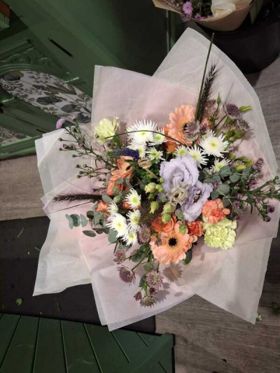 Classic Florist Choice - Created by The Florist of Bere, this elegant peach and lilac bouquet is a graceful combination of soft colour, freshness and floral beauty.