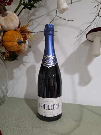 Hambledon Classic Cuvée - Hambledon's signature and best-selling traditional method sparkling wine. Our Classic Cuvée is a well-balanced blend of all 3 traditional grapes, handpicked on our own estate. Aged at least 35 months, it is vibrant, with structured yet ripe acidity.
